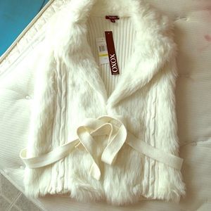 White furry vest