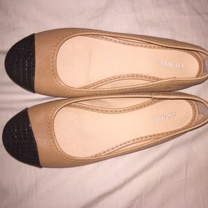 Tan and black flat