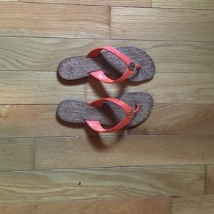 Tory Burch leather flip flops.