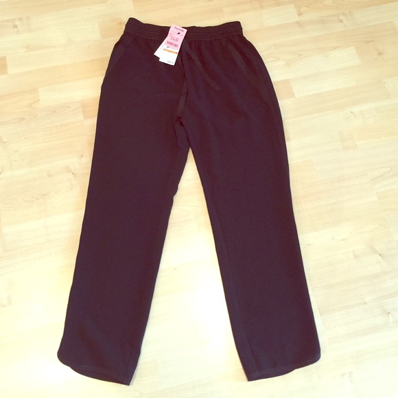 Black, stretch, loose fitting pants