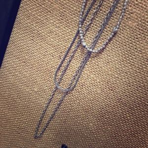 Long multi-layer multi-strand silver necklace