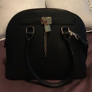 Black bag with gold accents