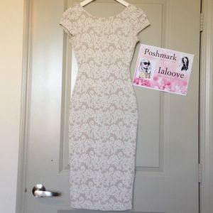 Elegant Cream lace pattern Dress.