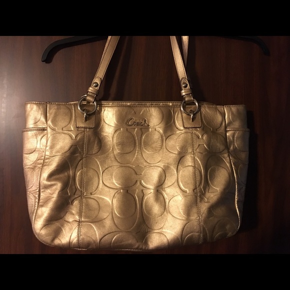 Gold coach purse