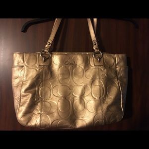 Gold coach purse
