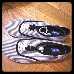 Size 7 black and white stripped sneakers