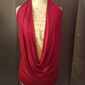 Plunging neckline, open back halter top