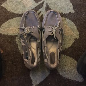 Grey sperrys with animal print on side size 10