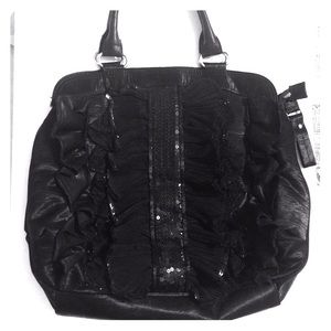 Black bag with romantic lace layering