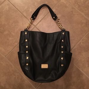 MICHAEL KORS BLACK PURSE WITH GOLD; gently used