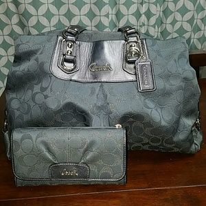 Gray Coach handbag with purple lining.