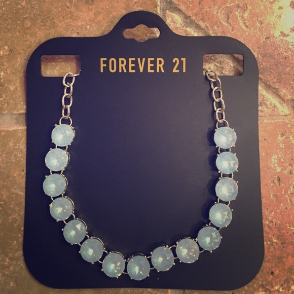 Light blue silver necklace.