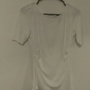 T shirt cinched at the waist with teardrop cutout