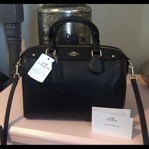 Black coach satchel