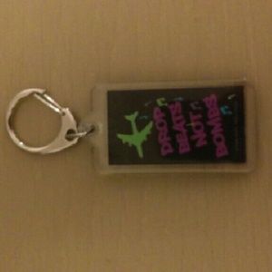 "Drop beats not bombs" keychain