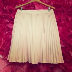 Pale pink pleated skirt