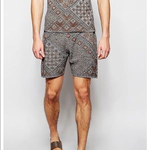Men's knit pool shorts in Aztec print. Size XXL.
