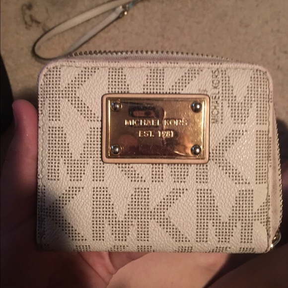 Authentic MK white wallet: on hold