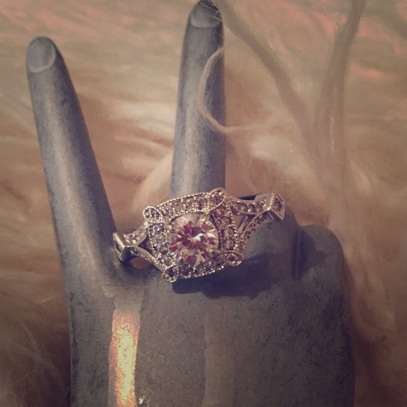 Costume ring with halo setting
