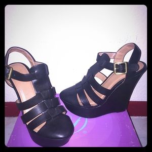 Brand new size 7.5 black closed toe wedges.