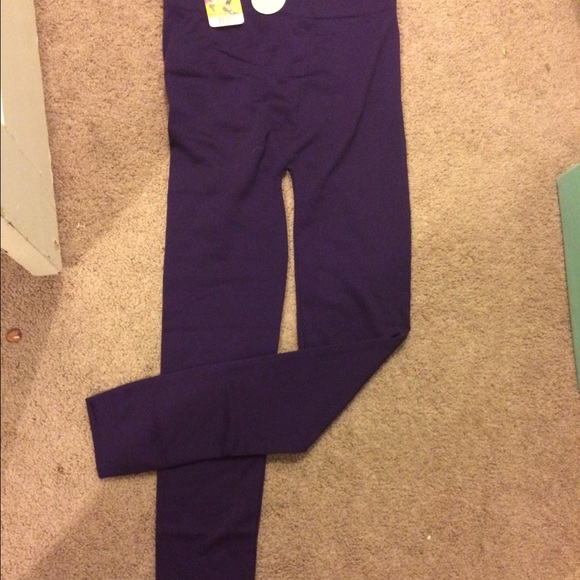 Purple leggings never worn with tags