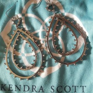 Silver Kendra Scott earrings.