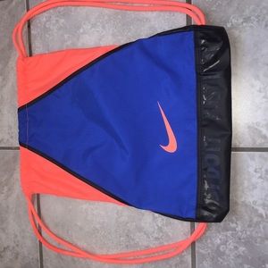 blue & neon pink nike sling bag