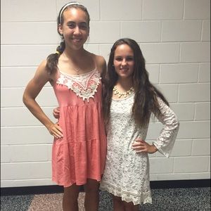 The pink dress on the left