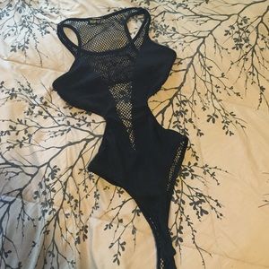 Black mesh onesie.