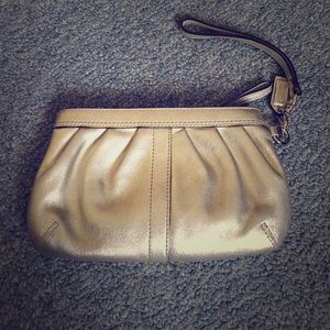 Silver coach wristlet