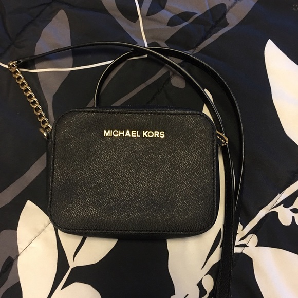 Small MK jet cross body.