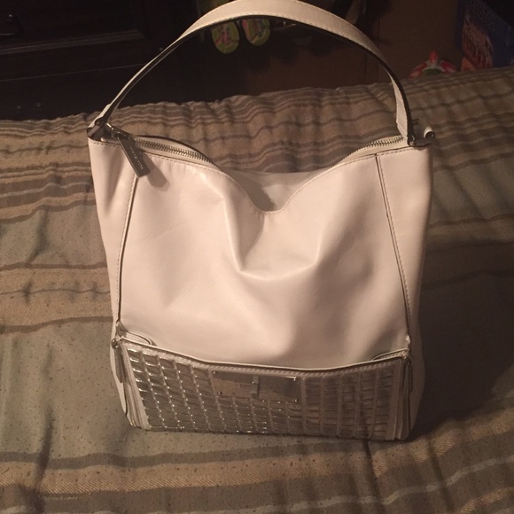 Michael Kor white purse with silver on outside