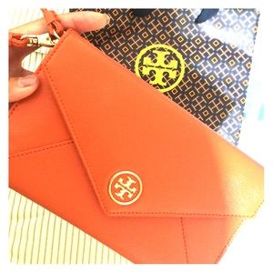 Tory Burch wristlet. Selling in Merc also