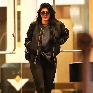 Black bomber jacket w/ orange lining