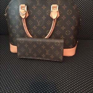 Designer inspired handbag with wallet.