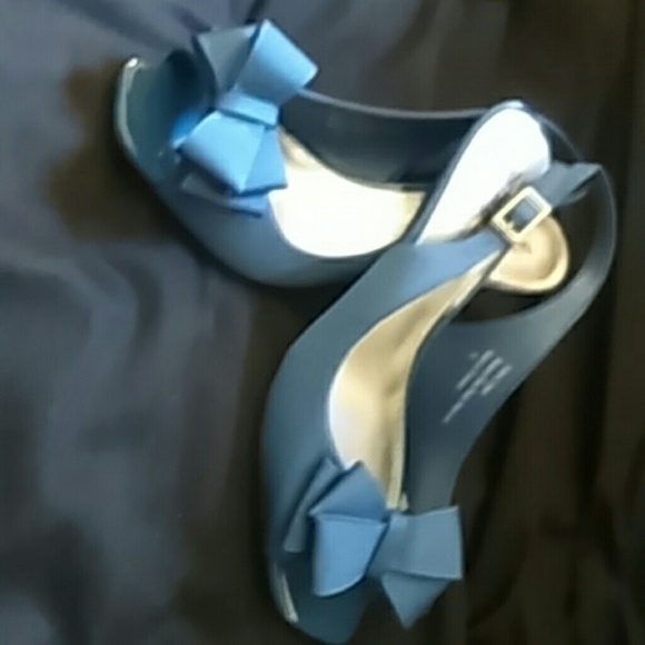 Coach and four  womens high heel shoes