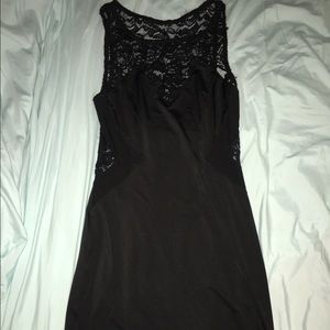 Skin tight black dress worn once for a cruise