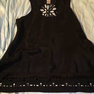 Black blouse with floral openings