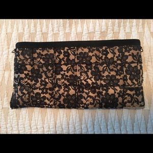 Harvey's seatbelt bag lace clutch
