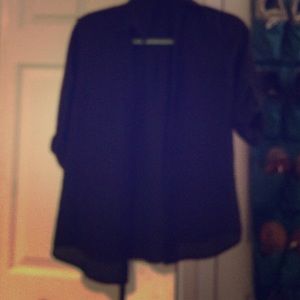 Black button up blouse also comes in white