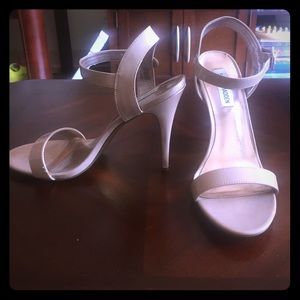 Nude open toe heels.