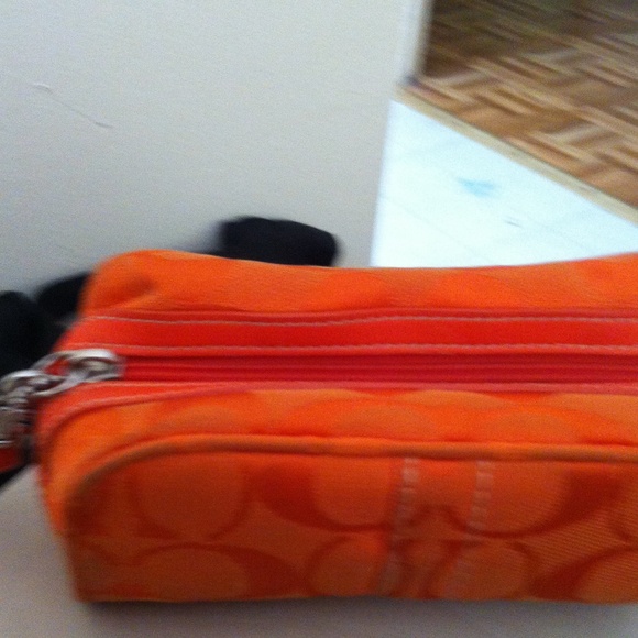 Coach wristlet orange
