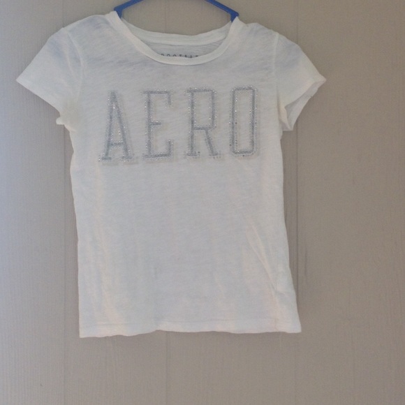 A white and sliver shirt