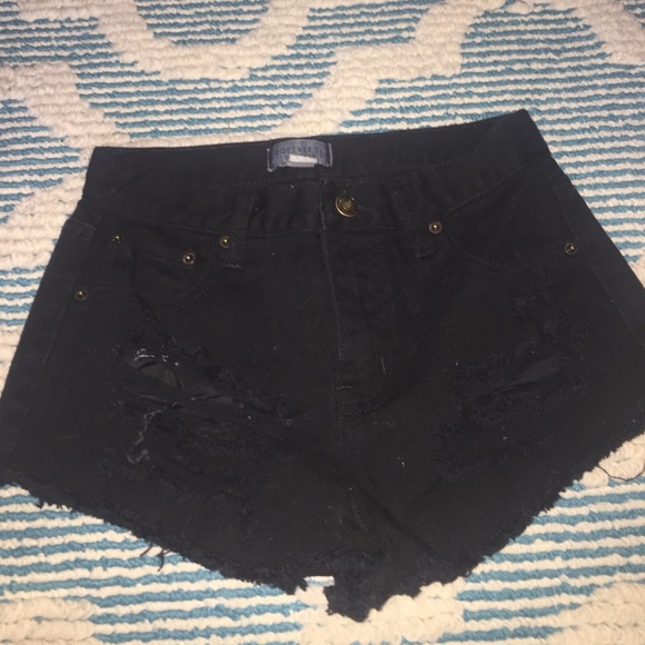 High waisted black distressed denim shorts