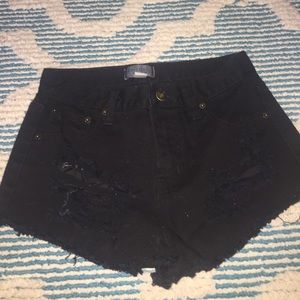 High waisted black distressed denim shorts