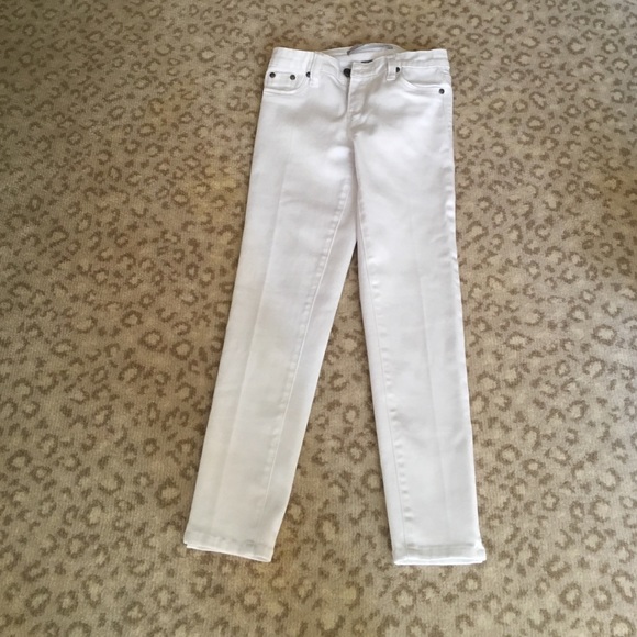 Today I am trying to sell girl white tractor jeans