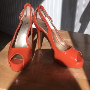 Statement piece orange peep toe heels
