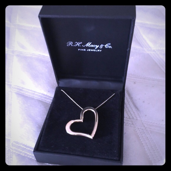 Gold 14 K heart necklace angled