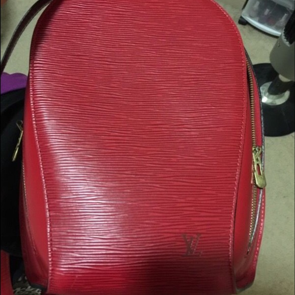 Red authentic Louis Vuitton backpack