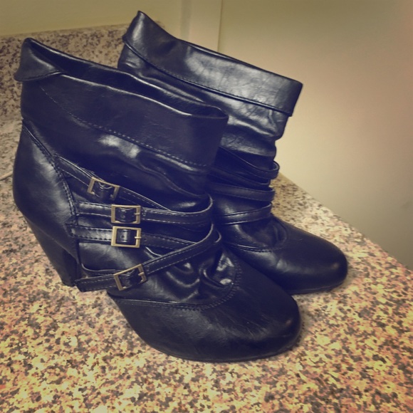 Black ankle boots with buckles